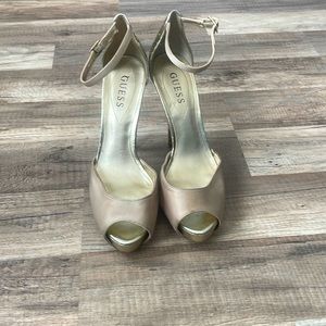 Womens gold Guess heels with glitter on back/heels size 8